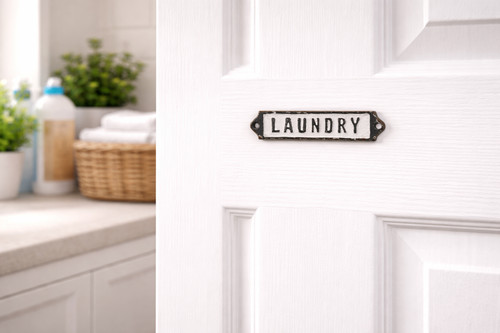 Cast iron laundry sign - cast,