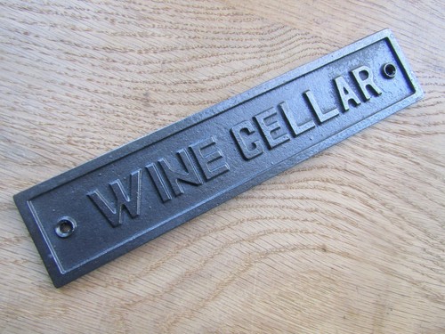 Rustic iron plaque wine cellar - rustic,