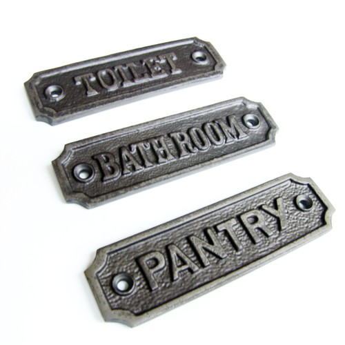 Metal toilets door sign - sign, cast